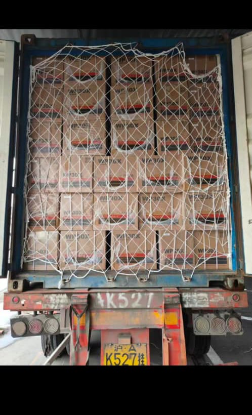 Cartons of goods loaded in a shipping container